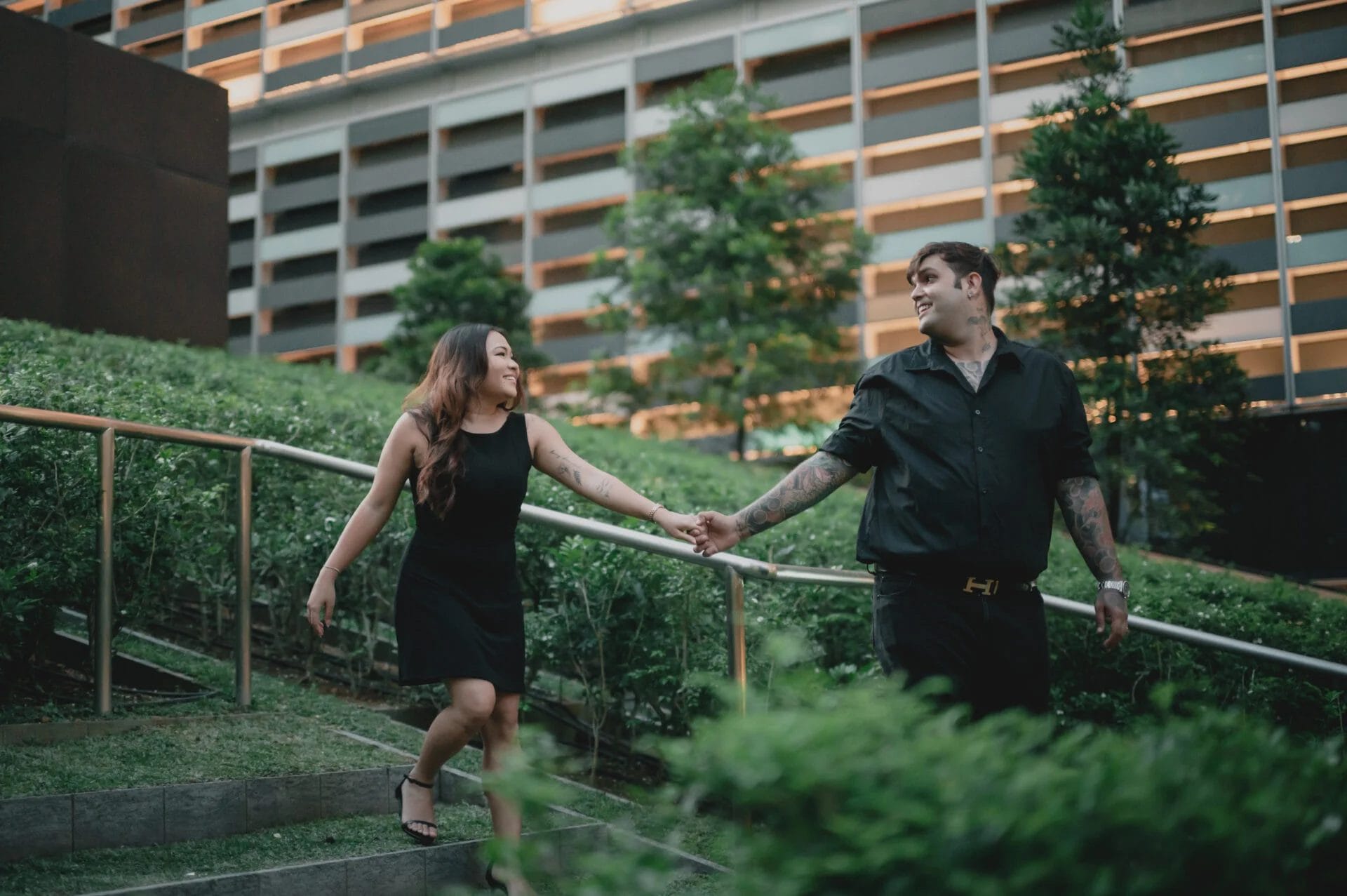 happy couple doing poses for their engagement photoshoot