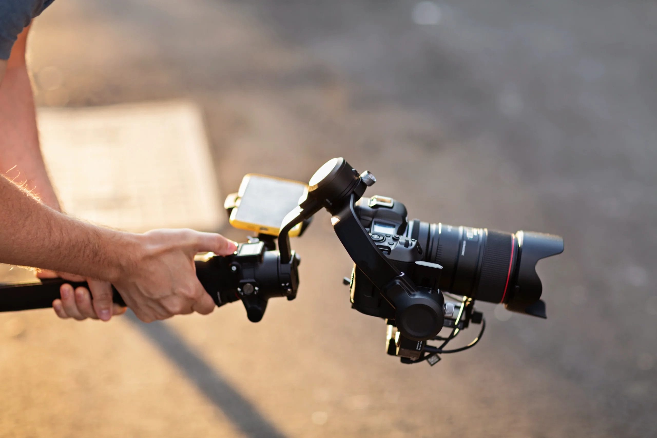 Operator using modern technology stabilizer for camera